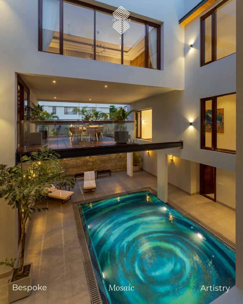 Custom glass pool tiles with geometric Moroccan designs