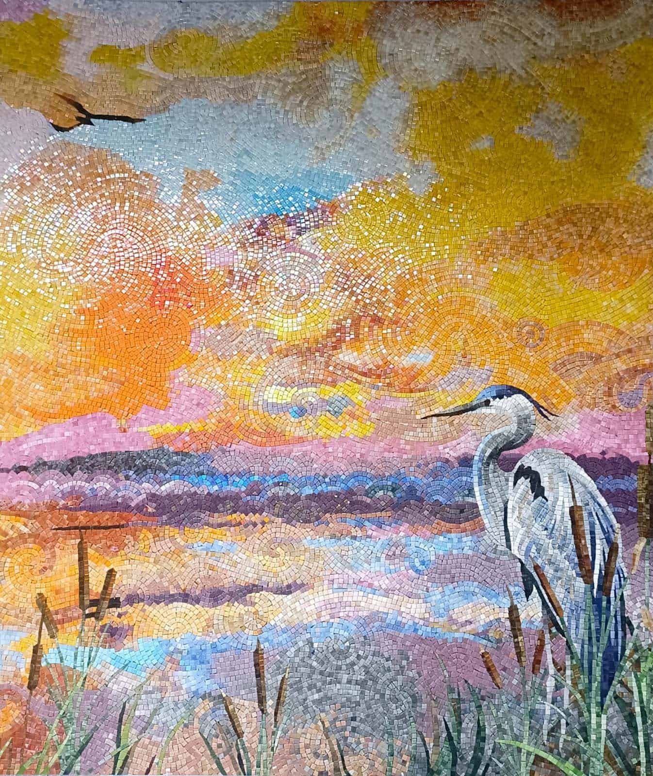 luxury sunset mosaic mural featuring a graceful heron by a lakeside with handcrafted swirling tesserae in warm pastel tones