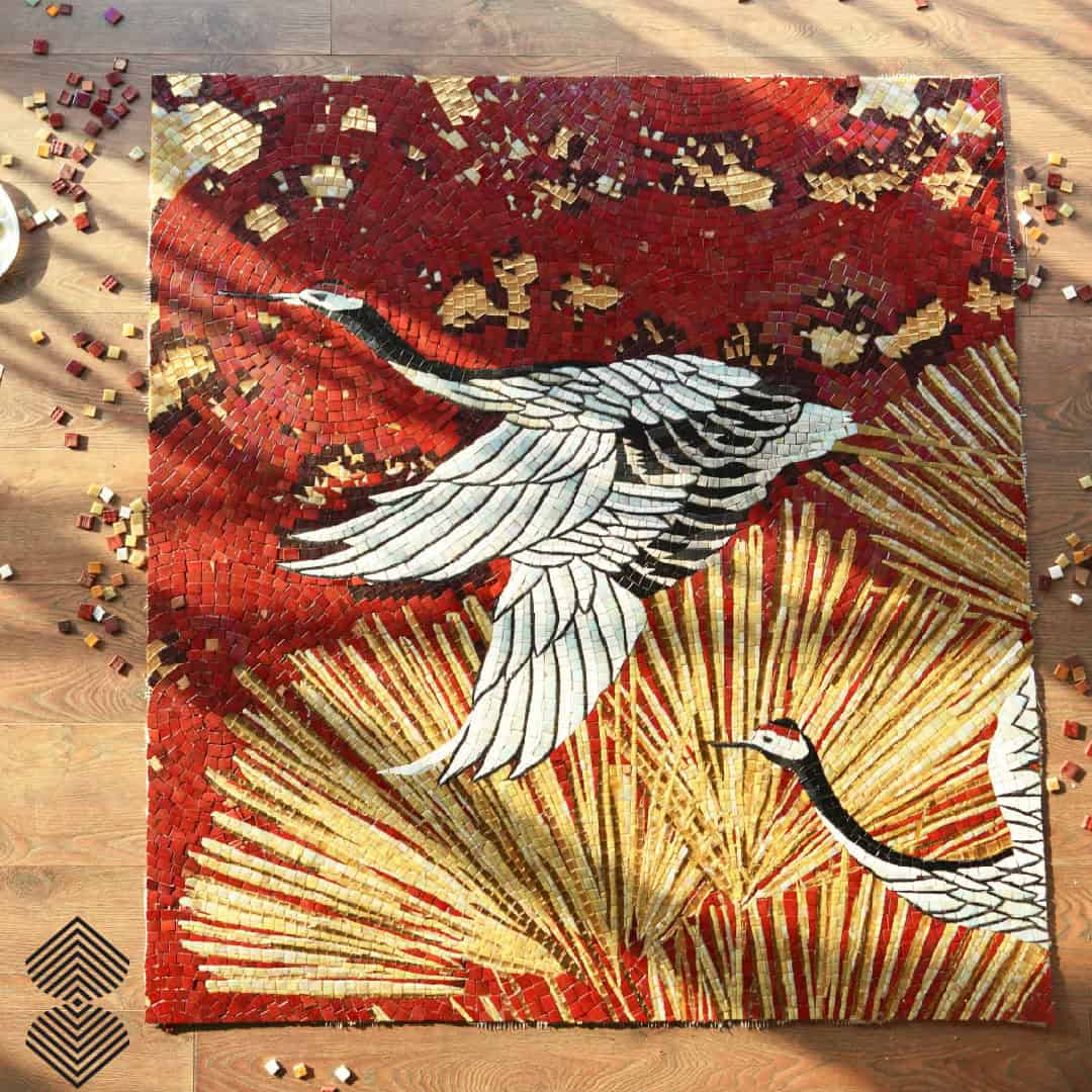 luxury crane mosaic artwork with crimson and gold handcrafted tesserae featuring radiant sunburst patterns and elegant flying birds