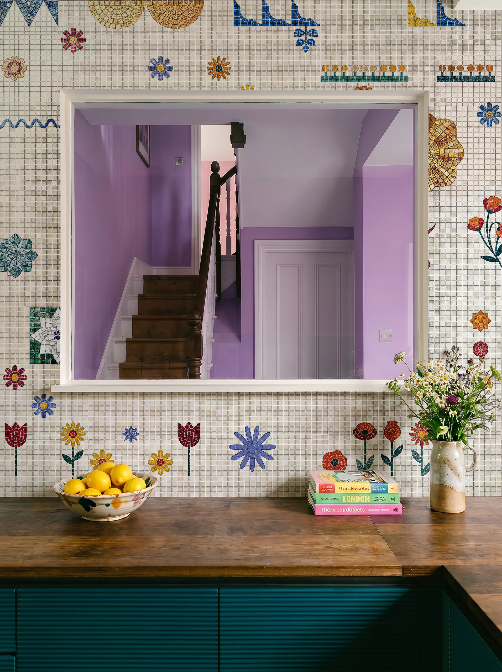 colorful botanical mosaic backsplash featuring vibrant flowers, geometric motifs, and handcrafted details on an ivory mosaic background