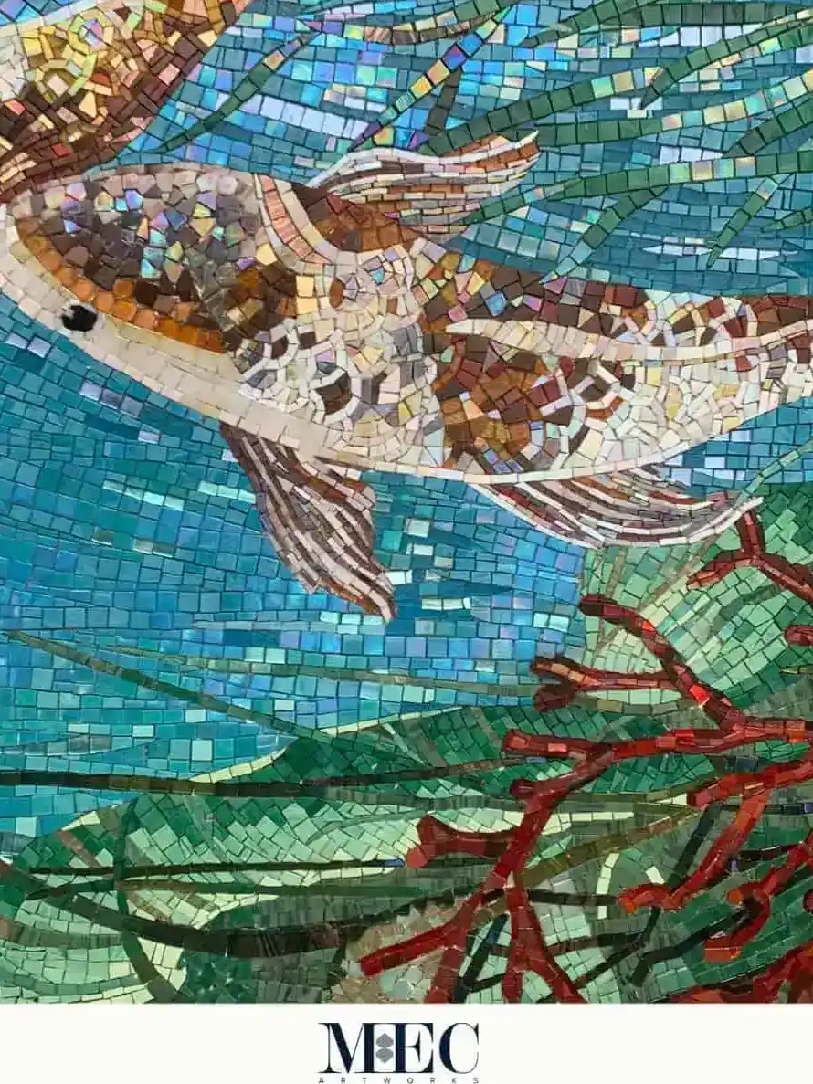 A vibrant and multicolor aquatic mosaic artwork with a graceful fish and red coral and green seaweed