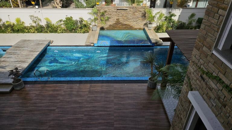 Handcrafted glass mosaic pool inspired by the movement of water