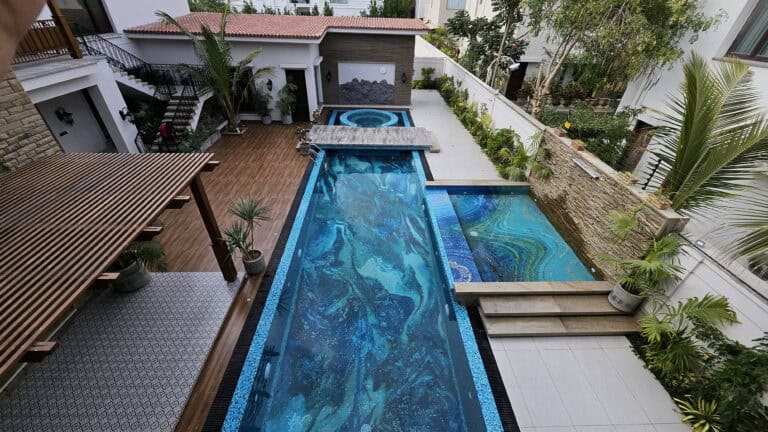 Premium hand-cut glass mosaic tesserae in layered blue ocean tones