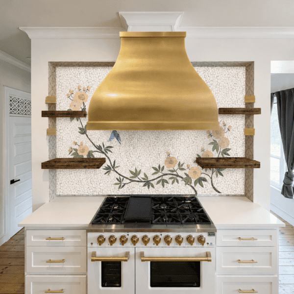Bluebird Blossom Mosaic Backsplash handcrafted botanical mosaic backsplash featuring cream flowers, green vines and a bluebird on a textured ivory mosaic background