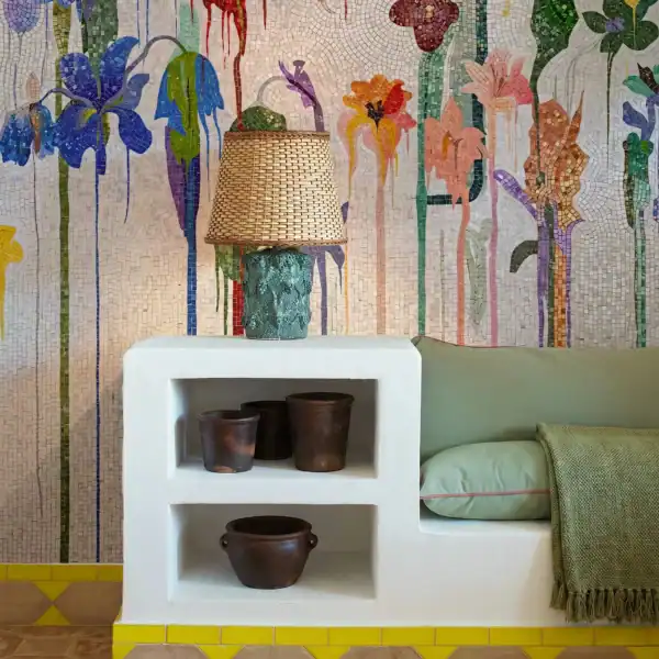 Deliquescent Flora colorful floral mosaic mural featuring elongated blooming flowers in vibrant handcrafted glass and stone mosaic on an ivory background