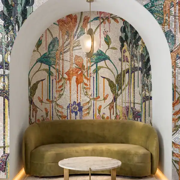 Weeping Eden tropical botanical mosaic mural featuring cascading flowers, lush green foliage, and handcrafted natural stone and glass tesserae
