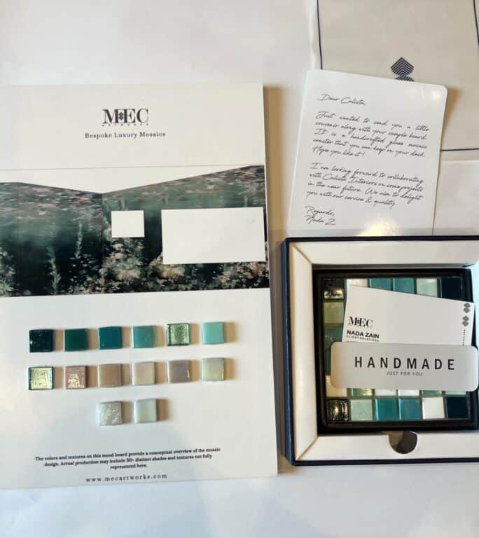 A presentation board from MEC Bespoke Luxury Mosaics containing an underwater design printout, and physical square glass tile samples.