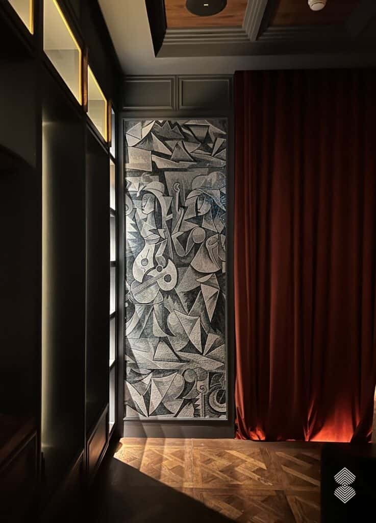 Custom mosaic tile for cafe interiors with contemporary furniture and lighting