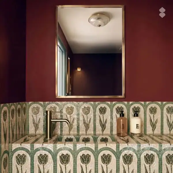 Basalt Calyx Bathroom Mosaic Basalt Calyx mosaic features repeating green tulips within ivory arches across a handcrafted bathroom vanity backsplash.
