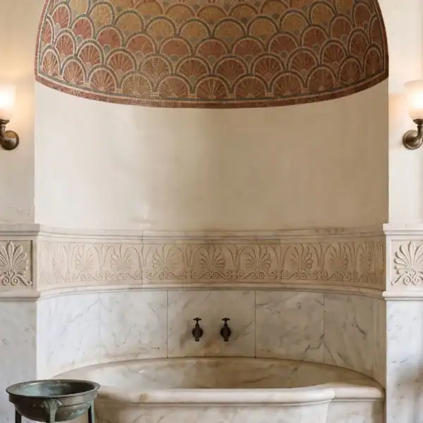 Roman Alcove Roman Alcove Mosaic with layered scallop and fan motifs in terracotta, beige and muted blue tones, handcrafted for a classical curved wall niche.