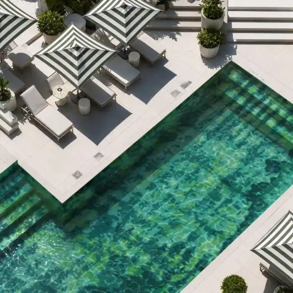 The Chrysoprase The Chrysoprase Mosaic features emerald, jade and turquoise glass mosaic tesserae creating a luxurious green swimming pool and spa design.