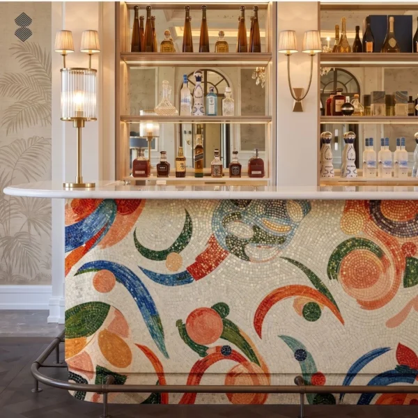coral-cadenza Coral Cadenza mosaic bar features colorful abstract curves, circles, and botanical forms across an ivory background.