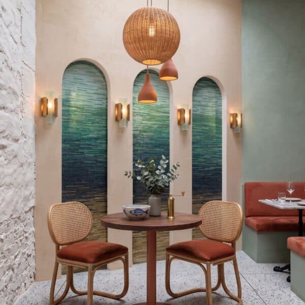 Ombre Blue-Green Arched Mosaic Panels Three arched niches filled with ombre arched mosaic panels shifting from teal to sage green tesserae.