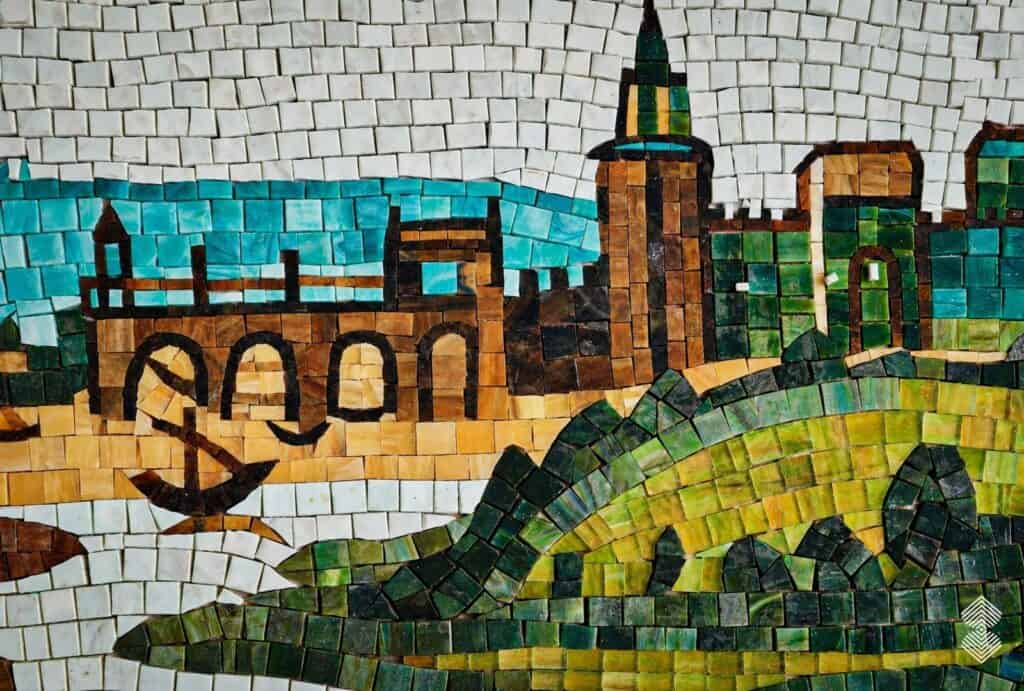 Custom Renaissance mosaic art featuring intricate hand-cut tesserae, classical figures, and vibrant colors inspired by famous paintings.