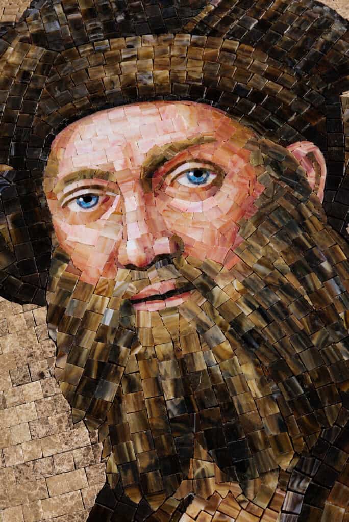 Portrait of Baldassare Castiglione recreated in mosaic with muted colors and detailed facial expressions.