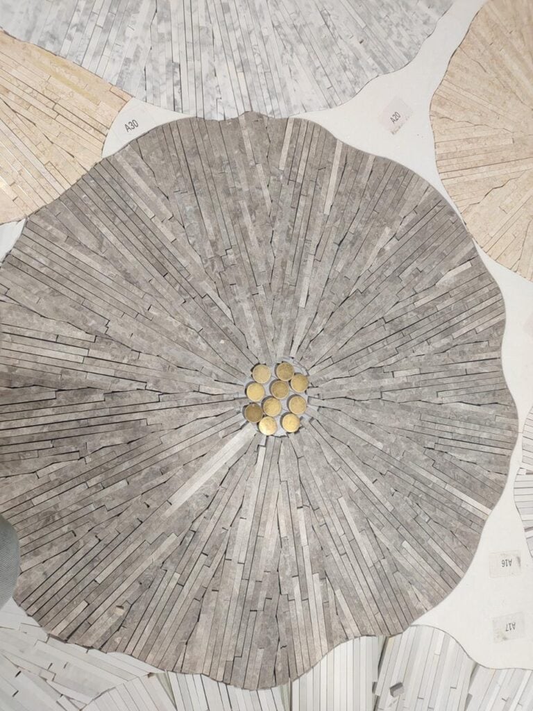 A floral mosaic crafted by MEC Artworks for a luxury washroom.