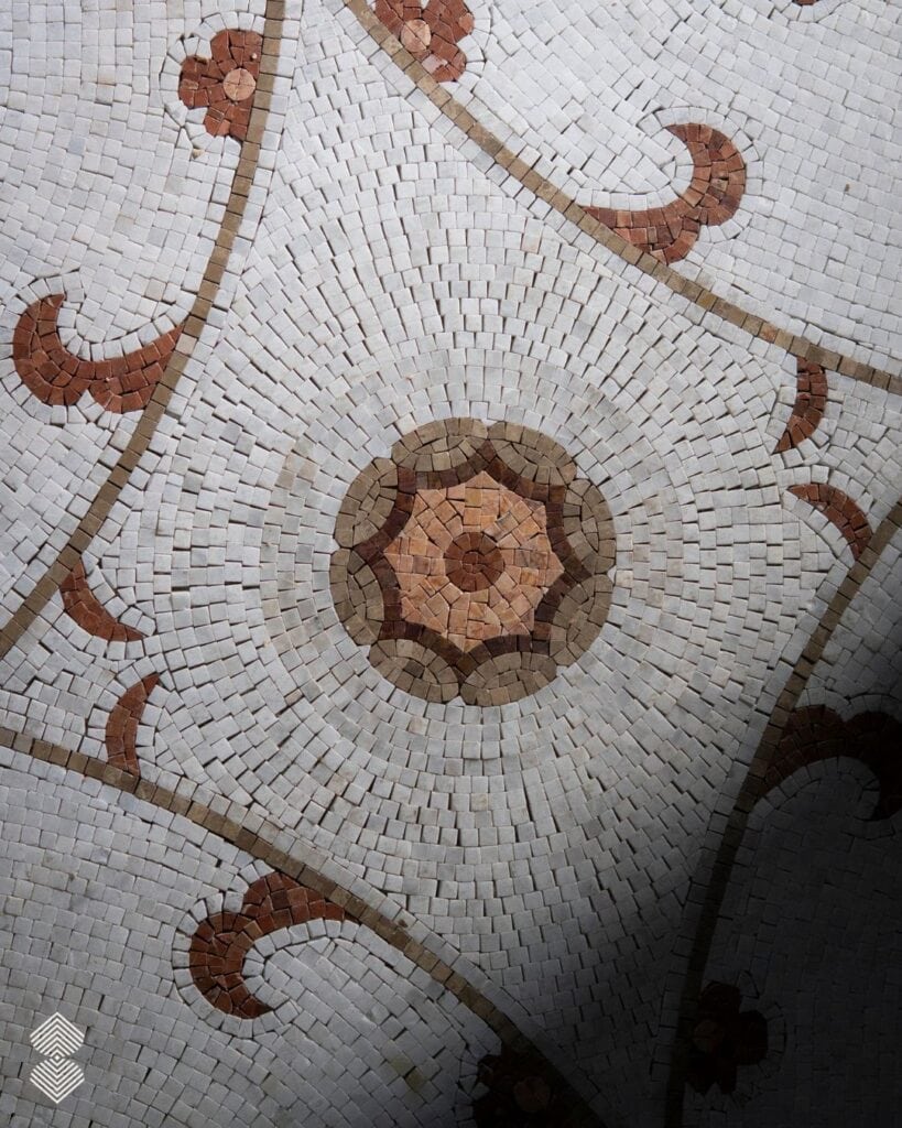	Detailed mosaic mural artwork featuring hand-cut marble