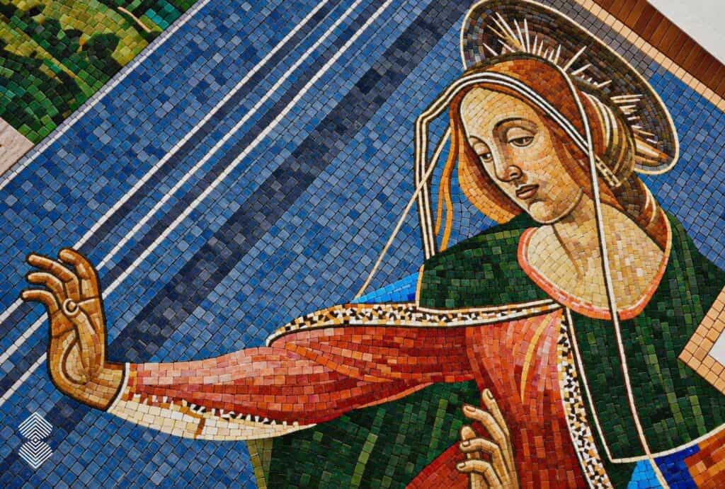 Handcrafted Annunciation mosaic featuring a quatrefoil medallion surrounded by gold scrollwork and geometric patterns.