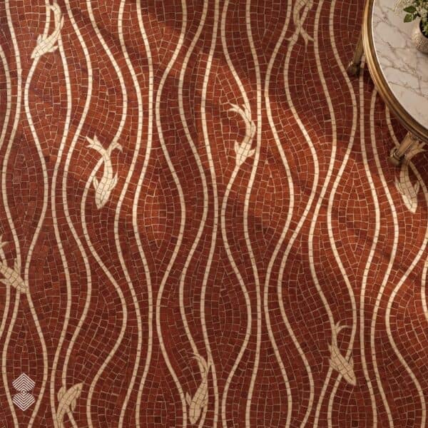 A roman fish mosaic floor with cream wave ribbons and small fish set into a rust-red stone field
