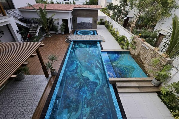 Premium hand-cut glass mosaic tesserae in layered blue ocean tones