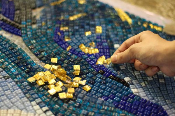 close up of abstract mosaic mkaing process featuring 10mm Vertex glass and 24 karat gold foiled oro glass mosaic