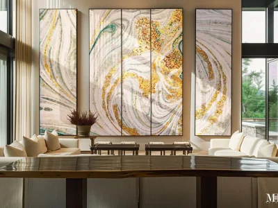 Multi-panel mosaic wall mural with swirling abstract patterns in white, gold, and soft green tones, installed as a feature wall in a tall living room interior.