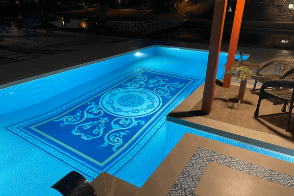 Dubai VIlla Custom glass mosaic tile medallion centered swimming pool motif by MEC night time