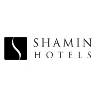Logo of Shamin Hotels with stylized S symbol and elegant serif font on white background.