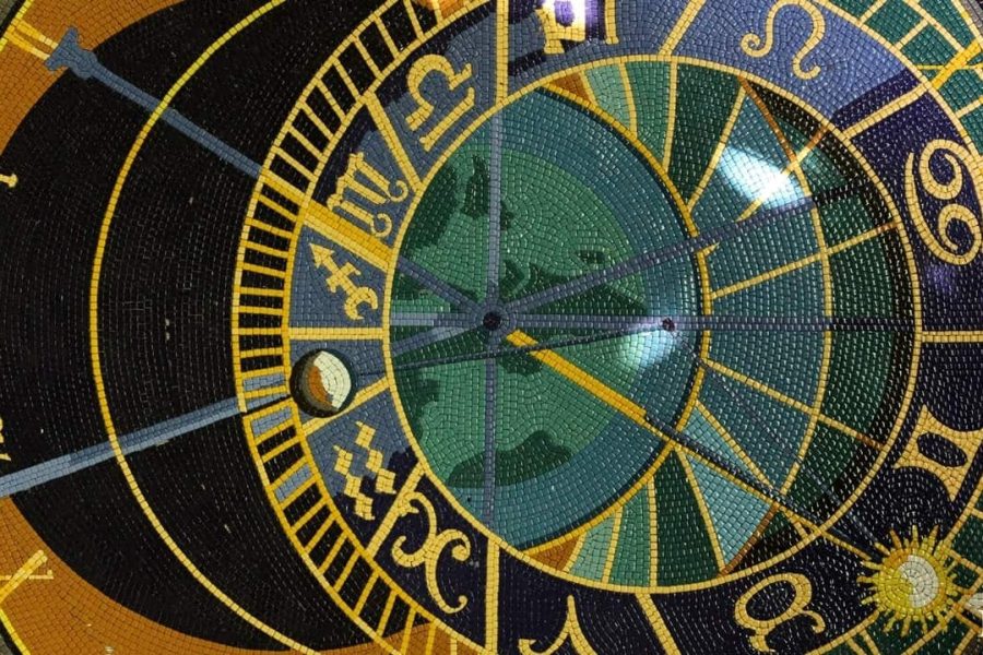 Orloj sun and moon dial mosaic tile floor medallion close up